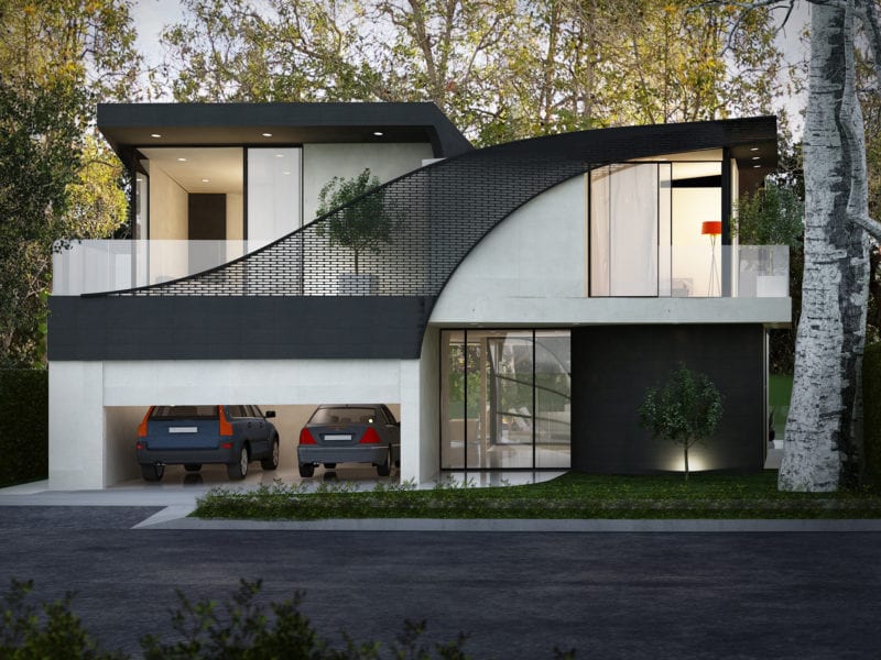 Modern two-story house with curved balcony and garage beneath.