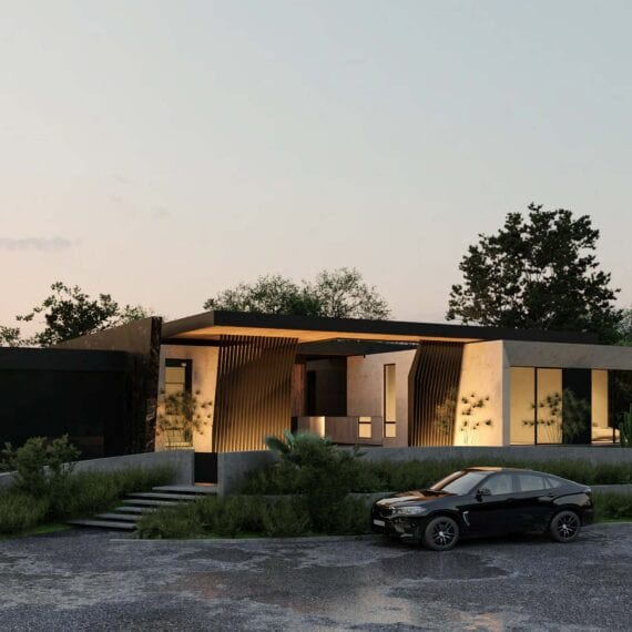 Modern house with warm lighting and a parked car at dusk.