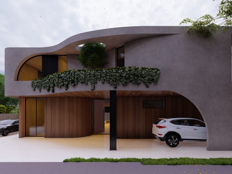 Modern house exterior with curved roof and greenery.